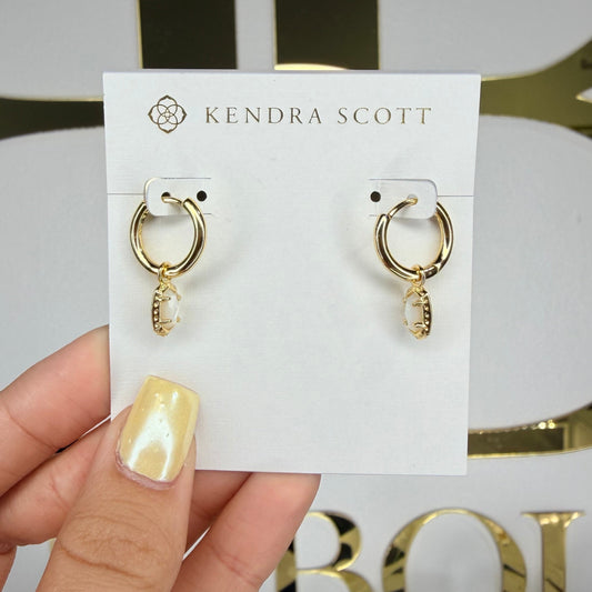 Kendra Scott huggie earrings in opal 