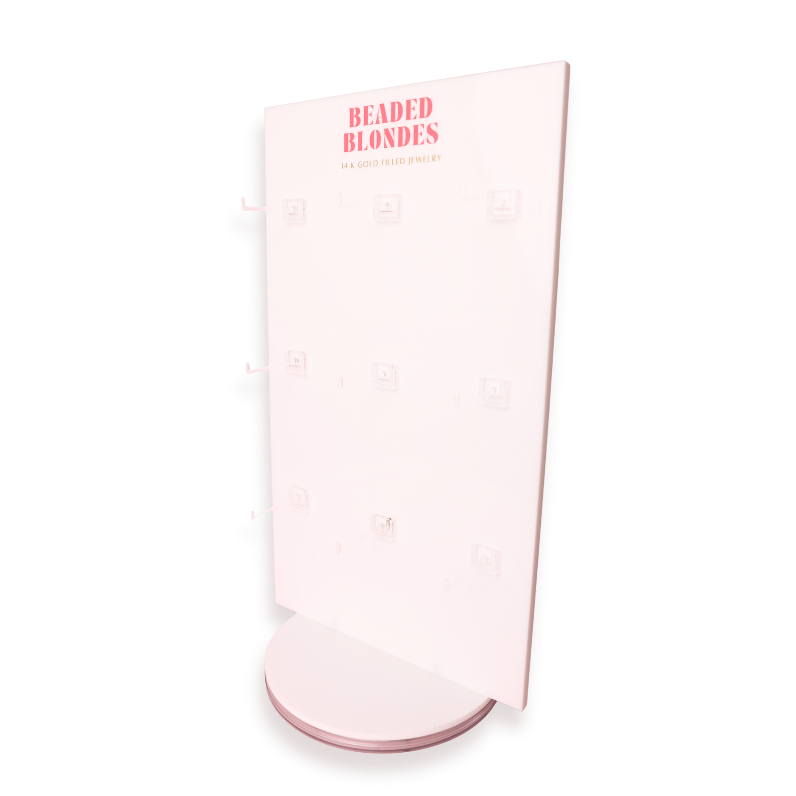 Pink cylindrical container with 'Beaded Blondes' branding on a white background