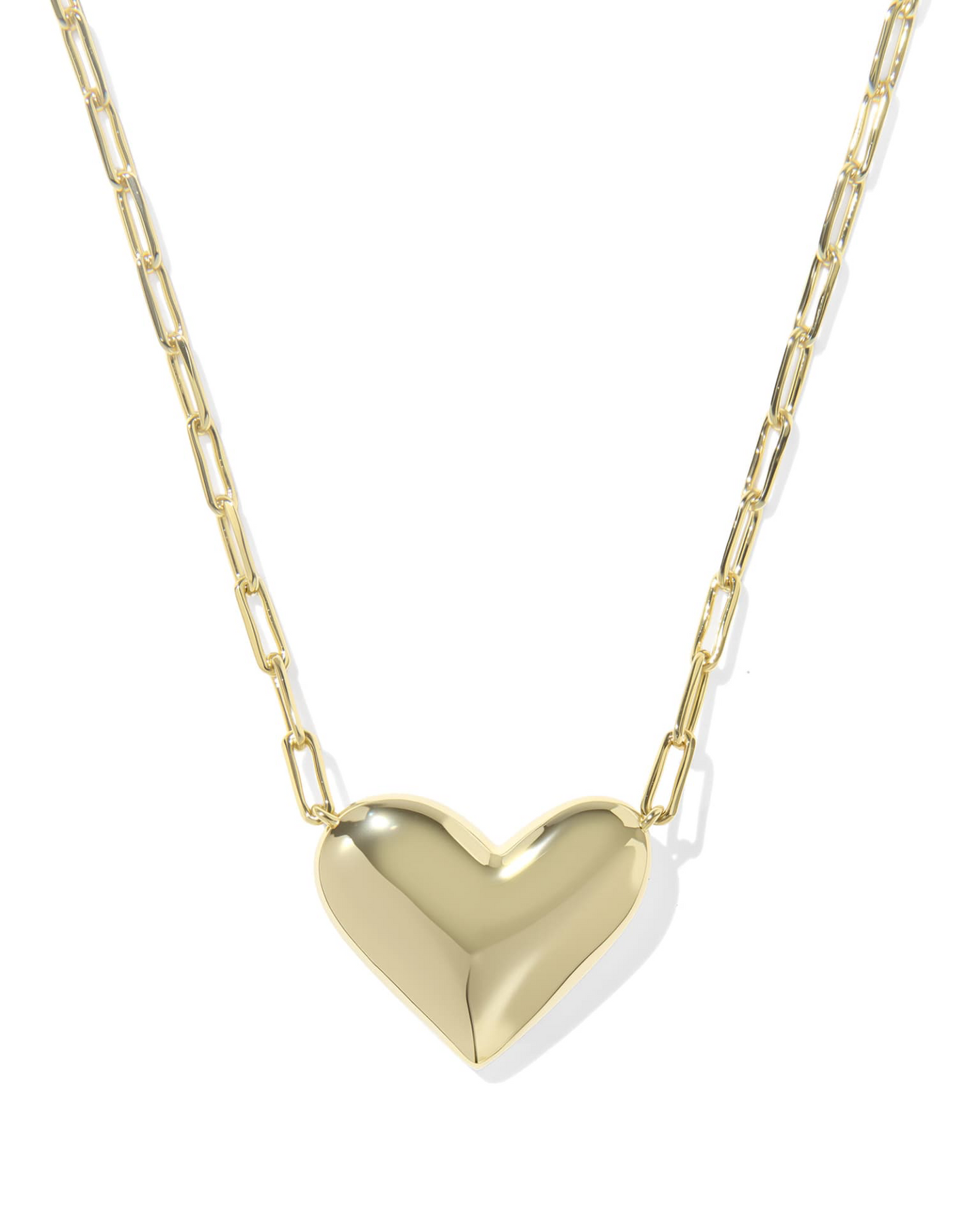 Gold heart-shaped pendant necklace on a white background