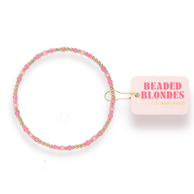 Beaded bracelet with 'Beaded Blondes' label on a clear background