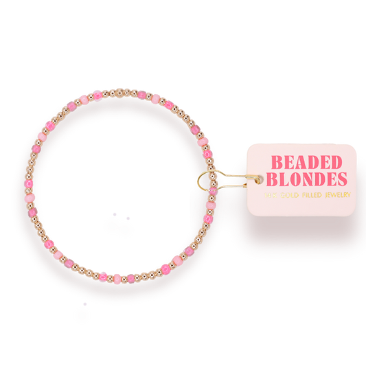 Beaded bracelet with 'Beaded Blondes' label on a clear background
