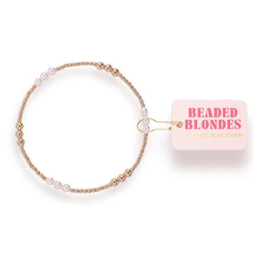 Beaded bracelet with 'Beaded Blondes' packaging on a white background