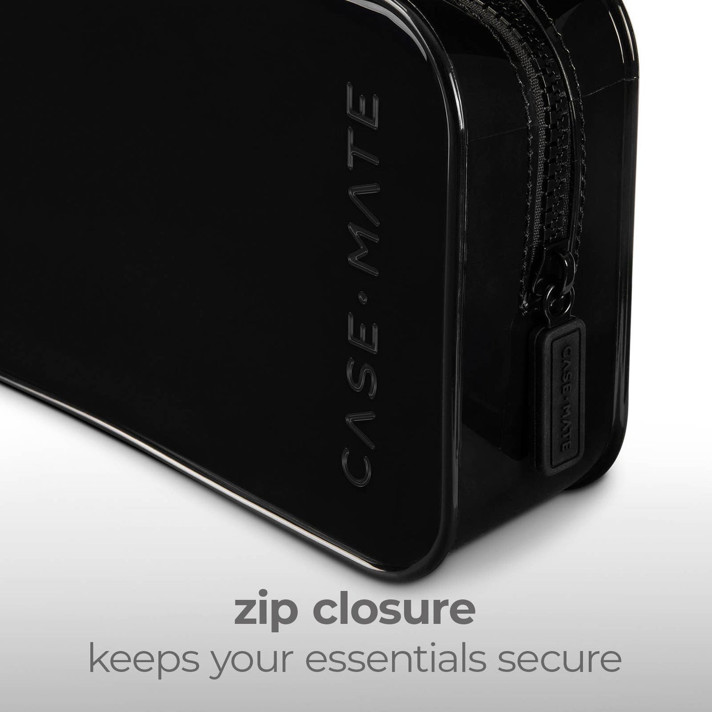 Close-up of a black Case-Mate zippered case showing the side zipper, embossed brand name, and a text overlay that reads 'zip closure keeps your essentials secure'.