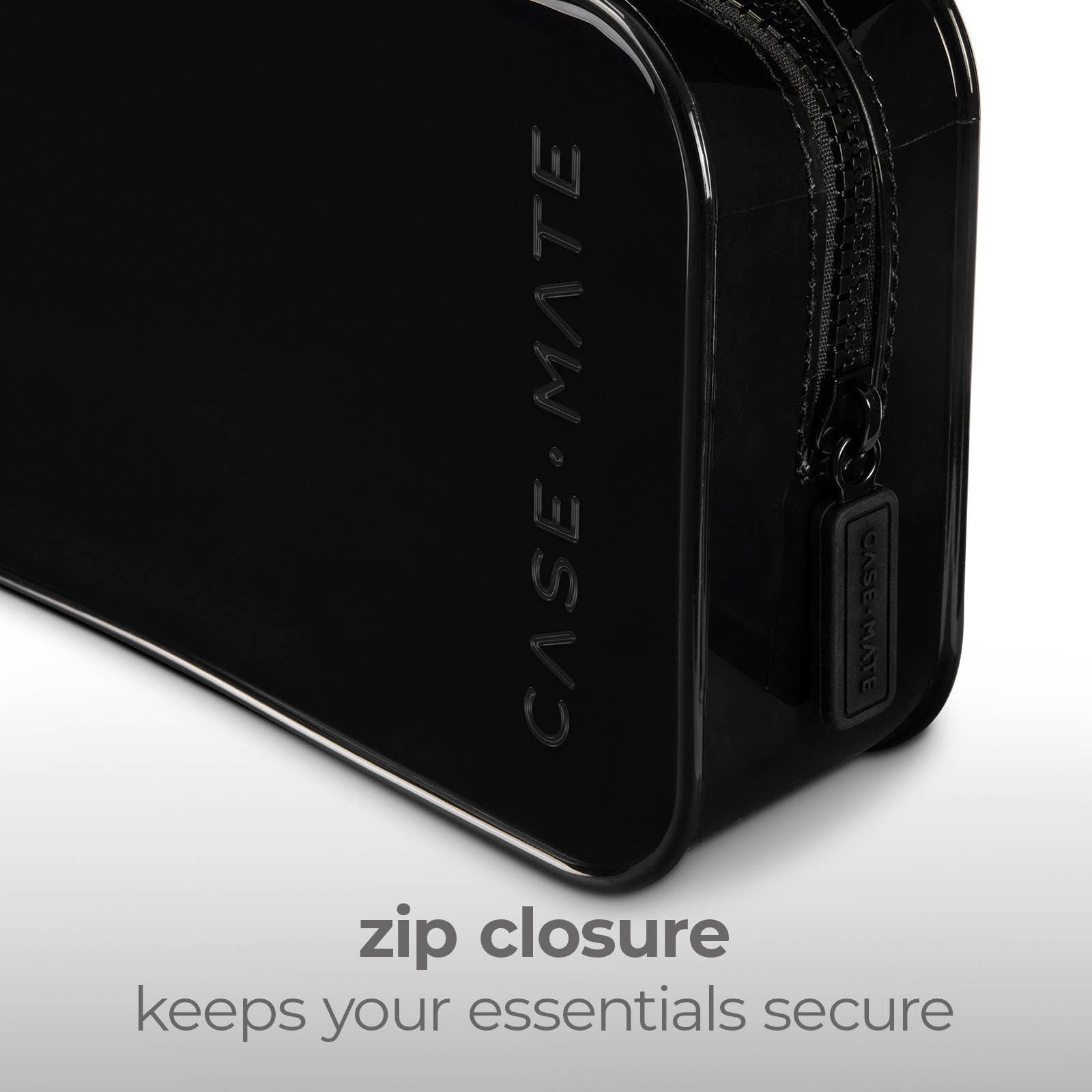Close-up of a black Case-Mate zippered case showing the side zipper, embossed brand name, and a text overlay that reads 'zip closure keeps your essentials secure'.