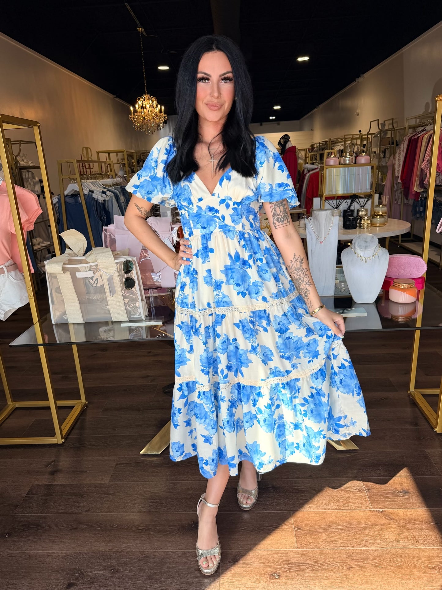 Model in blue floral maxi dress 