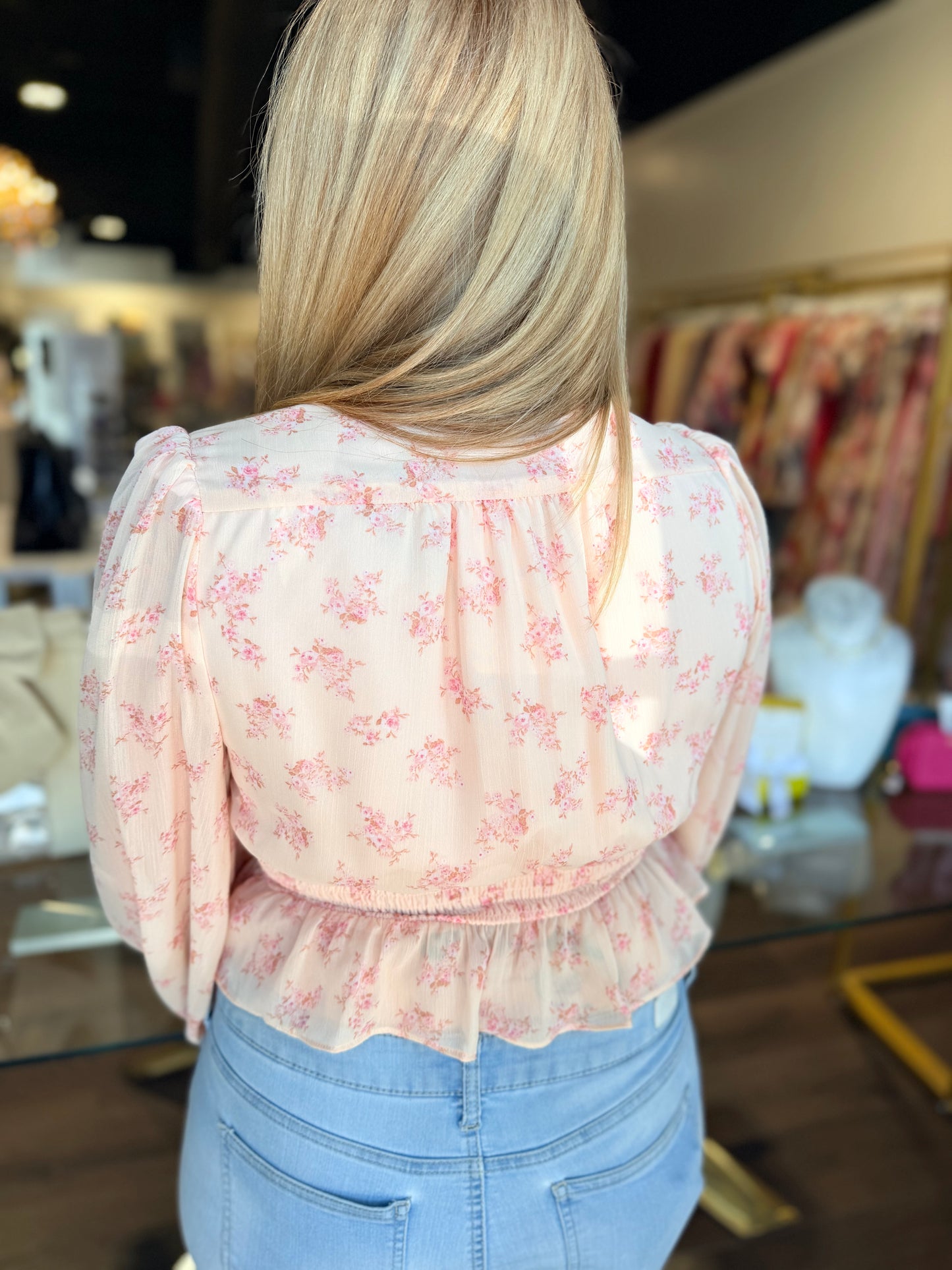 Back of floral blouse top in pink 
