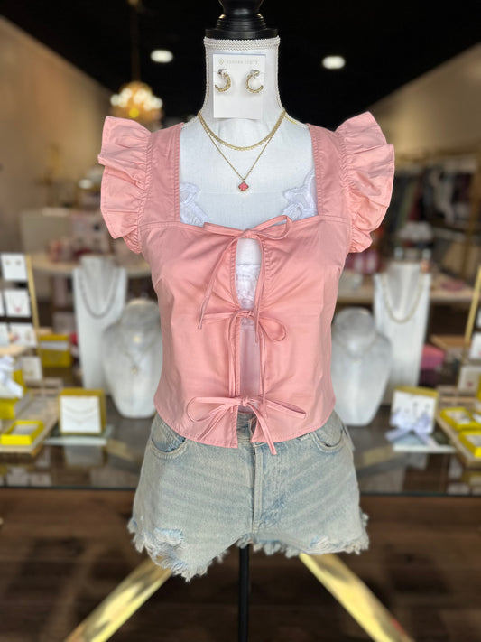 pink tie top with denim shorts 