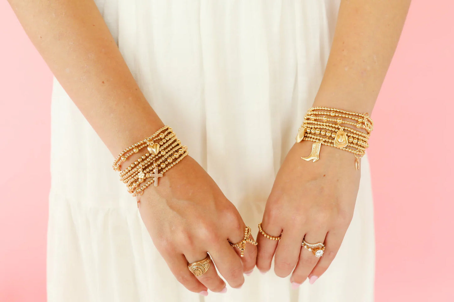 BOUTIQUE BEADED BLONDES CROSS GOLD CHARM BRACELET 