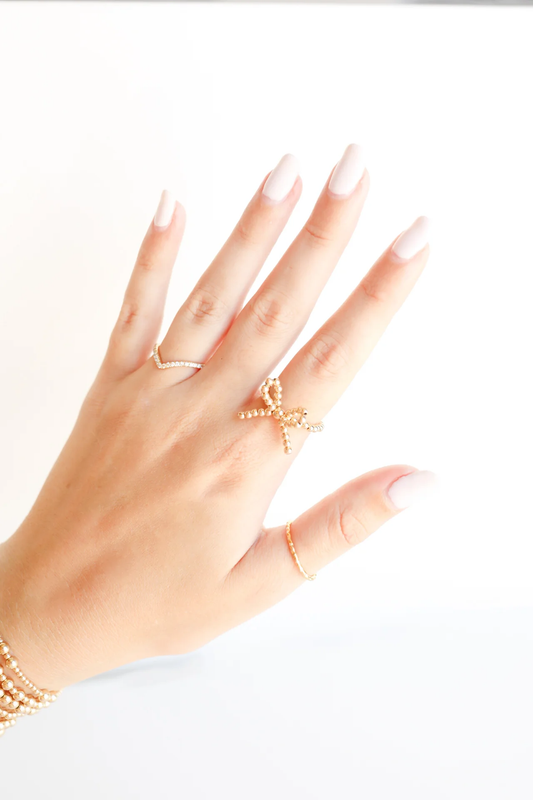 BOUTIQUE BEADED BLONDES GOLD BOW RING 