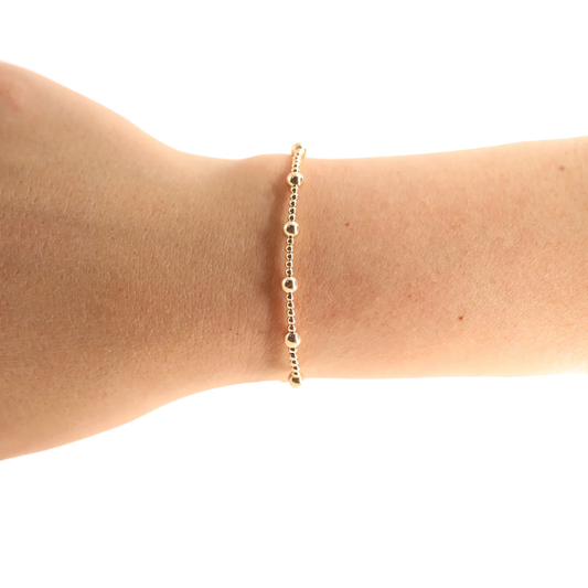 BOUTIQUE BEADED BLONDES GOLD JUNE BRACELET ON ARM