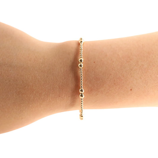 BOUTIQUE BEADED BLONDES GOLD LEAH BRACELET ON ARM