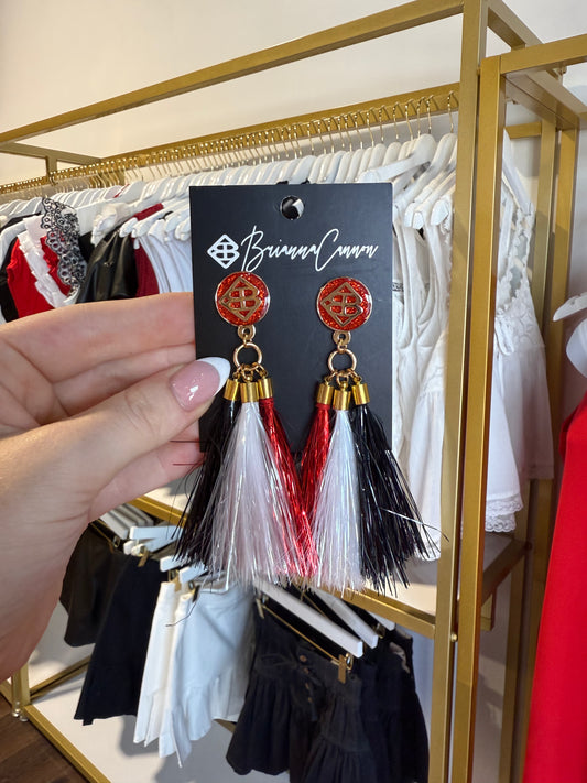 BOUTIQUE BRIANNA CANNON METALLIC JUMBO TASSEL EARRINGS IN HAND 