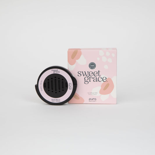 Black device with pink accents and 'sweet grace' packaging on a white background