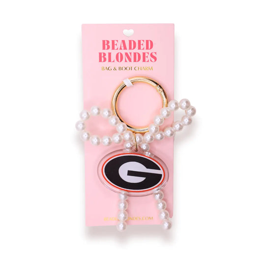 Beaded Blondes Georgia Bag and Boot Charm with a pearl bow and red-and-black Georgia logo on a display card.