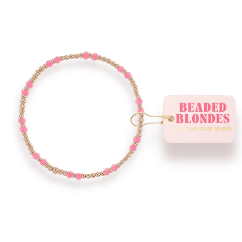 Beaded Blondes Hot Pink Hazel Bracelet in Gold beside a pink jewelry tag.