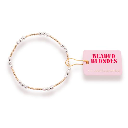 Beaded Blondes ILY Bracelet in Gold with Silver, showing three contrasting accent beads beside a pink tag.