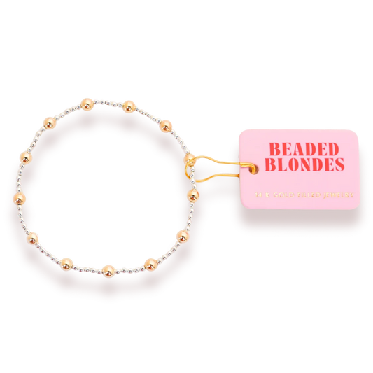 Beaded Blondes Lively Bracelet in Silver with Gold, showing mixed bead sizes and metal tones beside a pink tag.