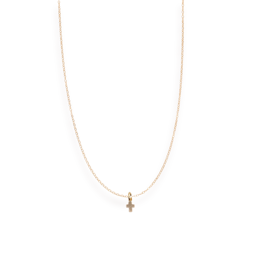 Close-up of the Mini Cross Charm necklace pendant and chain by Beaded Blondes.
