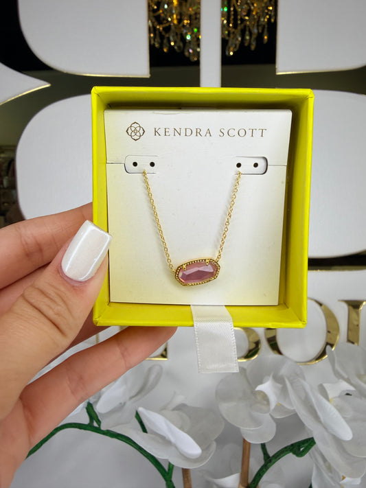 kinder scott gold pendant necklace with pink stone in a yellow kinder scope gift box