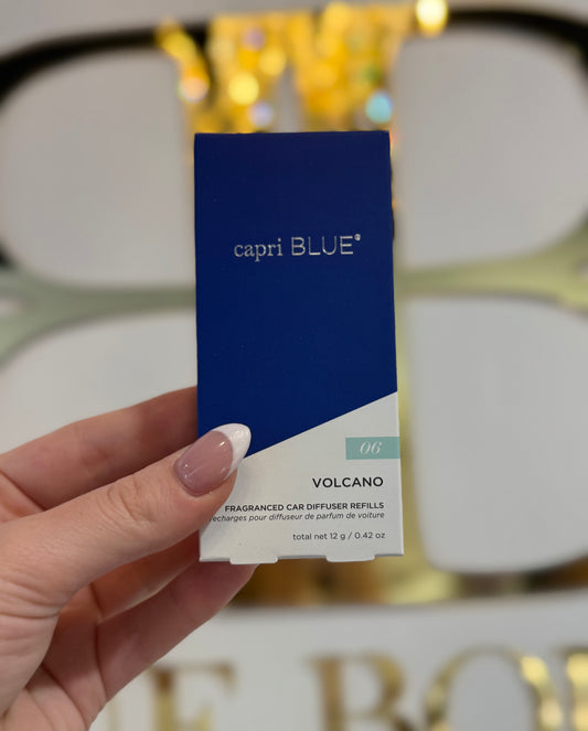 BOUTIQUE CAPRI BLUE VOLCANO FRAGRANCED CAR DIFFUSER REFILLS IN HAND