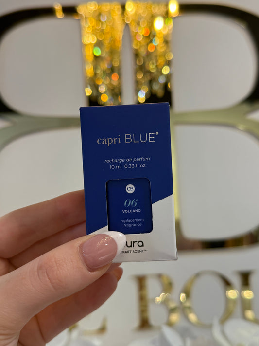 BOUTIQUE CAPRI BLUE VOLCANO PURA REFILL IN HAND
