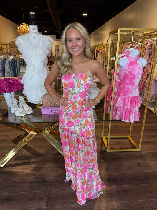 Model wearing ponk multi color maxi dress at BRITIQUE Boutique 