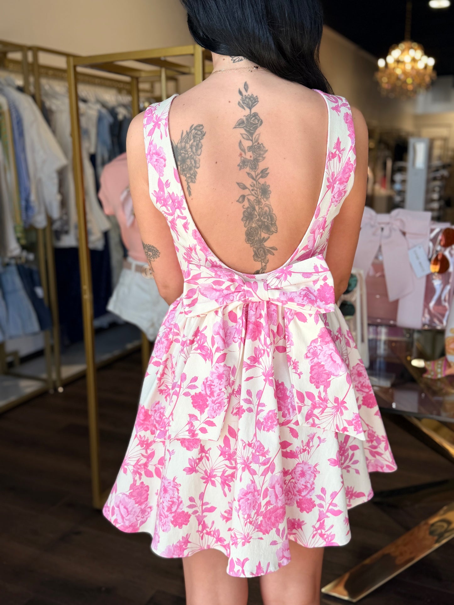Back of floral pink dress with bow 
