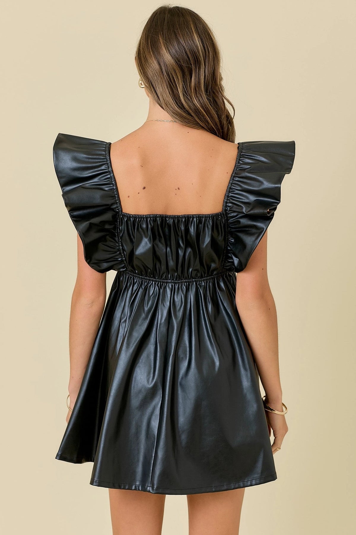 Day + Moon Midnight Memories Mini Dress, back view showing the gathered back and ruffle sleeves.