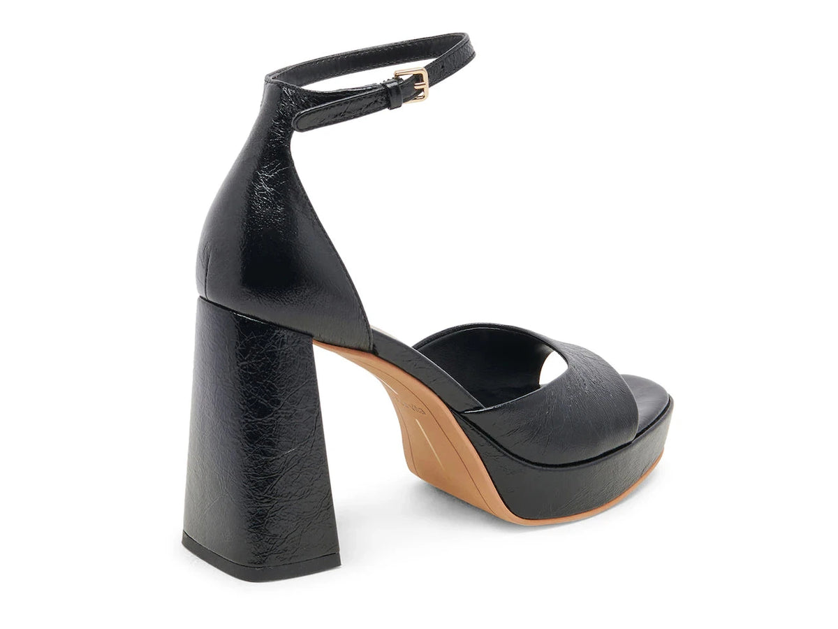 DOLCE VITA Pandro Heels in Midnight Crinkle Patent, rear angle view.