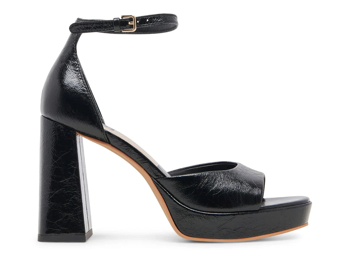 DOLCE VITA Pandro Heels in Midnight Crinkle Patent, side view.