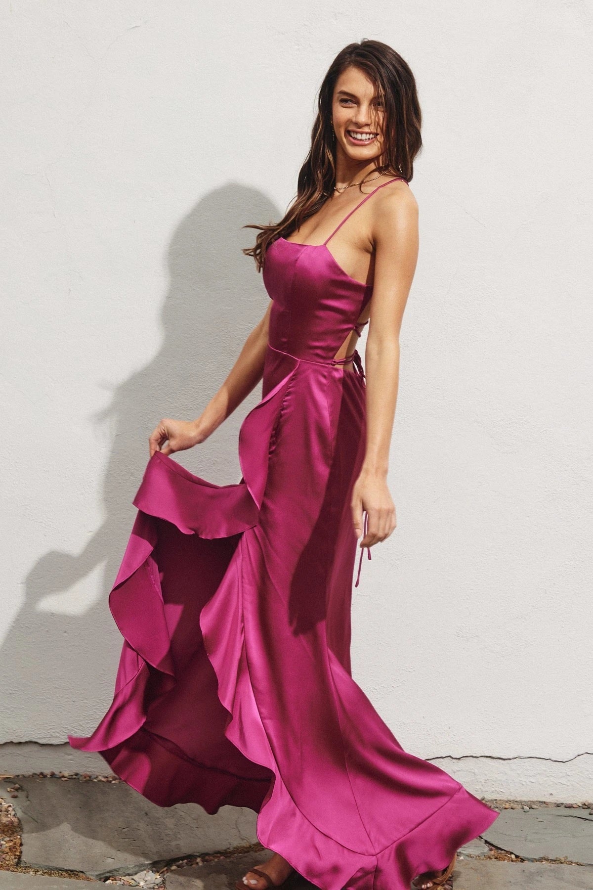 DRESS FORUM Going Out Open Back Ruffled Maxi Dress in Magenta, side view.