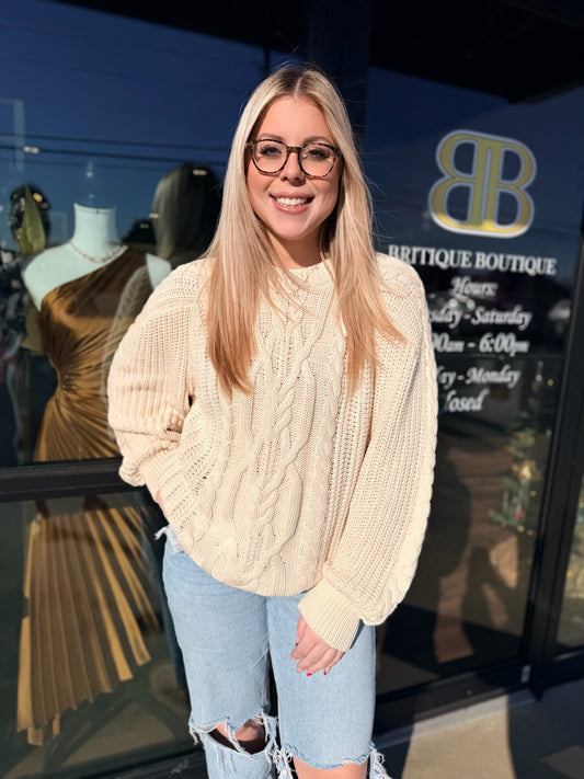 BOUTIQUE FREE PEOPLE FRANKIE CABLE KNIT SWEATER IVORY FRONT ON MODEL