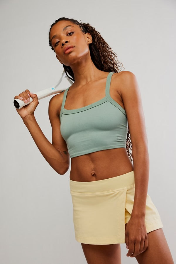 BOUTIQUE FREE PEOPLE MOVEMENT HOT SHOT MINI SKORT SUNLIT YELLOW FRONT