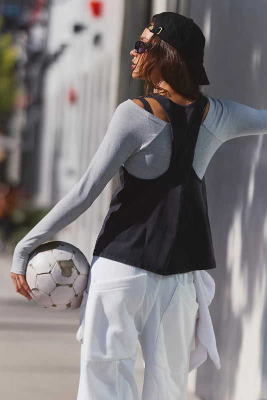 BOUTIQUE FREE PEOPLE MOVEMENT HOT SHOT TWIST TANK BLACK BACK