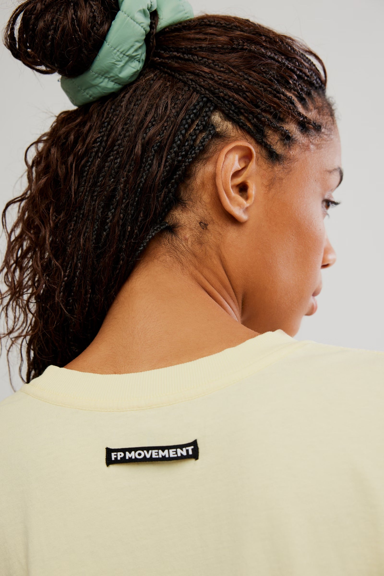 BOUTIQUE FREE PEOPLE MOVEMENT TACKLE TEE SUNLIT YELLOW BACK UP CLOSE