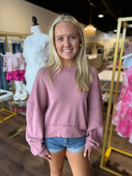 Model in Free People Rose Raisin Sweater at BRITIQUE Boutique 