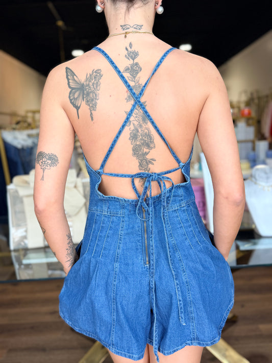 BRITIQUE BOUTIQUE MODEL IN FREE PEOPLE DENIM ROMPER BACK TIE VIEW