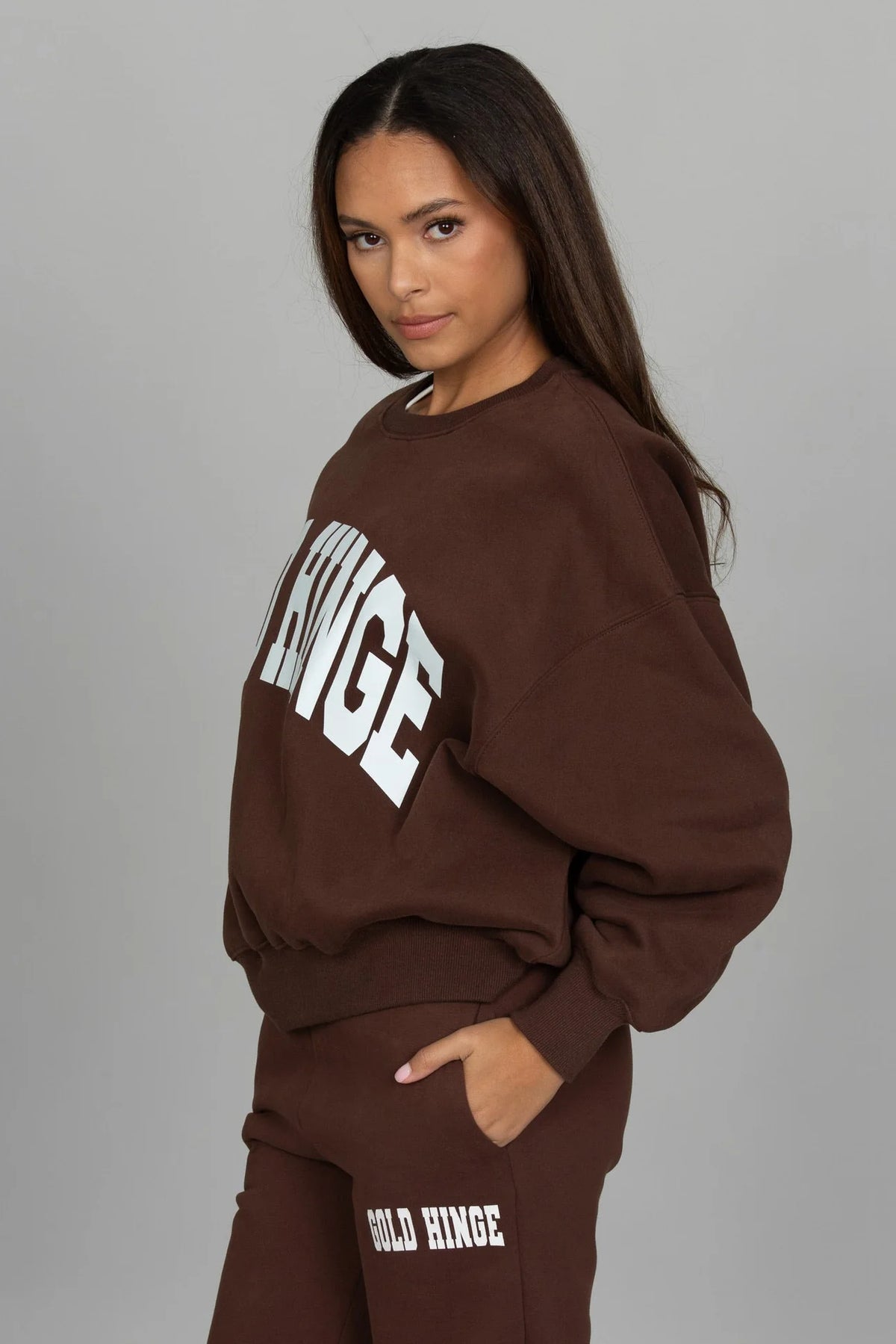 Side view of the GOLD HINGE GH Wide Arm Sweatshirt in Dark Brown
