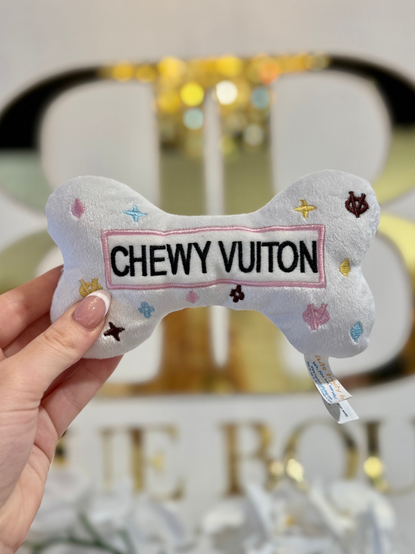 BOUTIQUE HAUTE DIGGITY DOG WHITE CHEWY VUITON BONE IN HAND