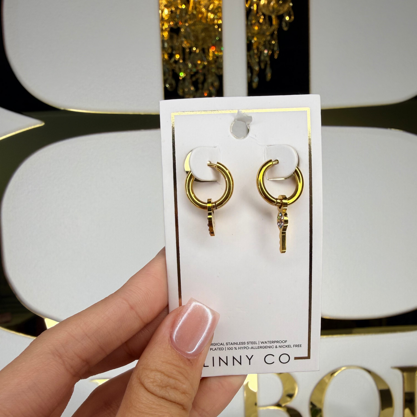 Linny co gold hoops with heart and key charm 