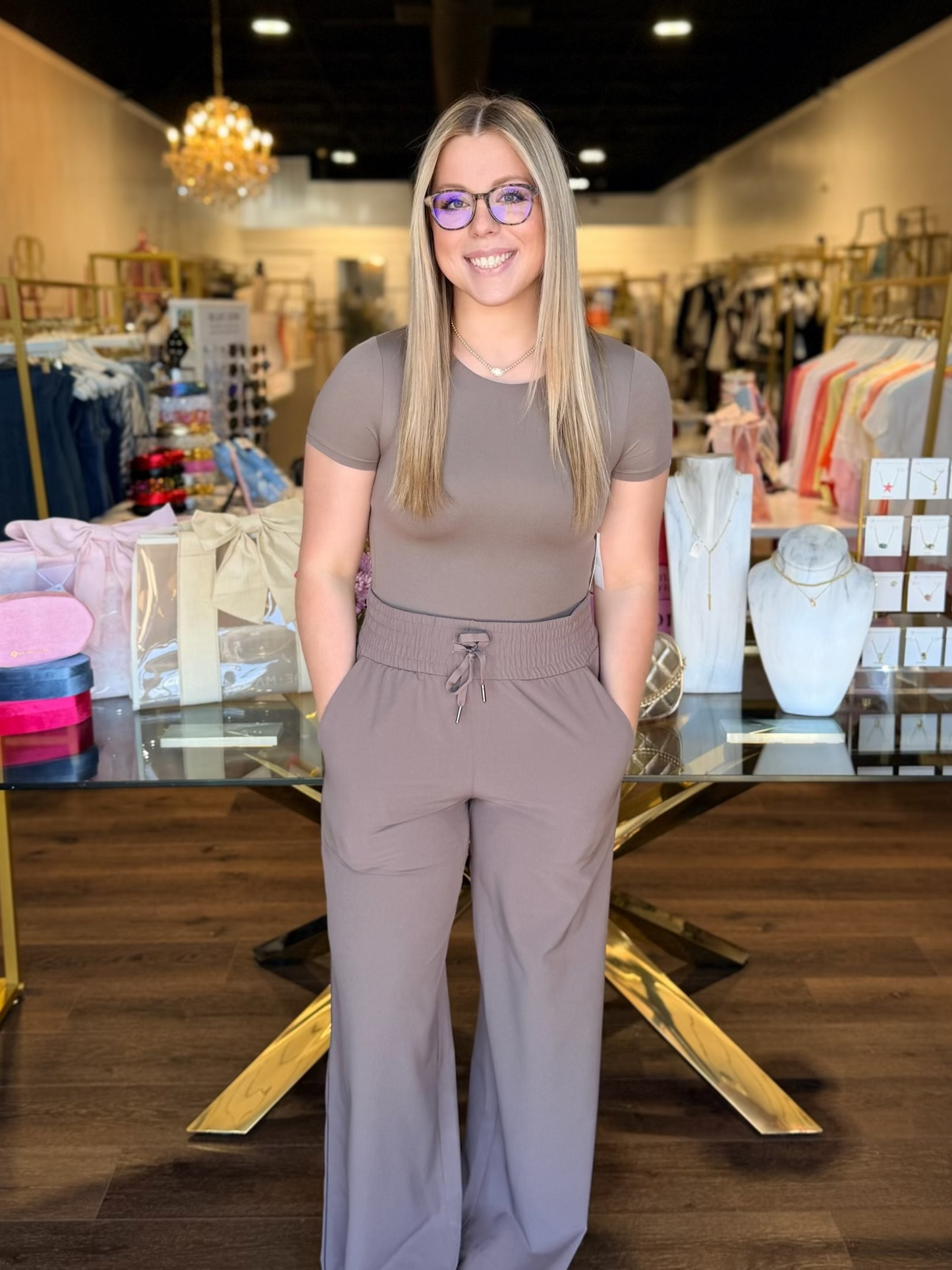 model wearing brown top with matching wide leg pants