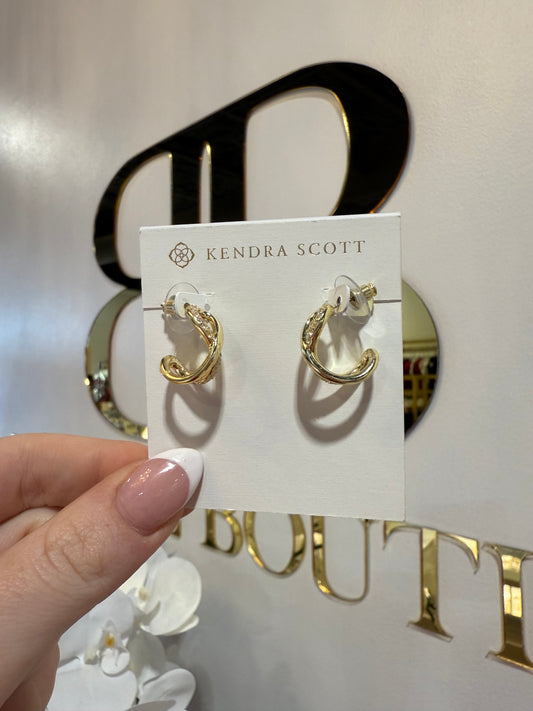 BOUTIQUE KENDRA SCOTT ANNIE GOLD INFINITY HUGGIE EARRINGS IN WHITE CRYSTAL IN HAND