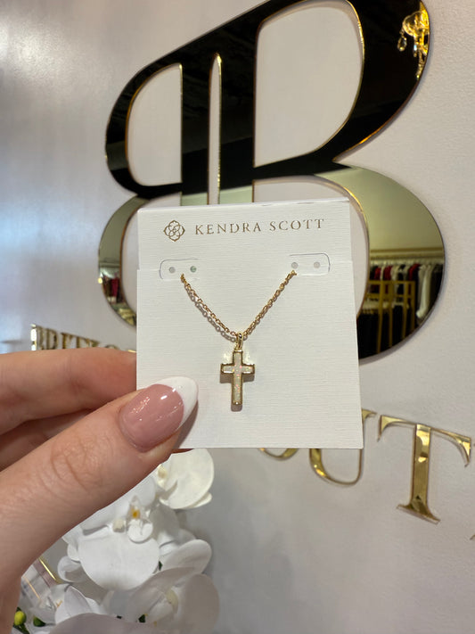 BOUTIQUE KENDRA SCOTT GOLD CROSS PENDANT NECKLACE IN WHITE KYOCERA OPAL IN HAND