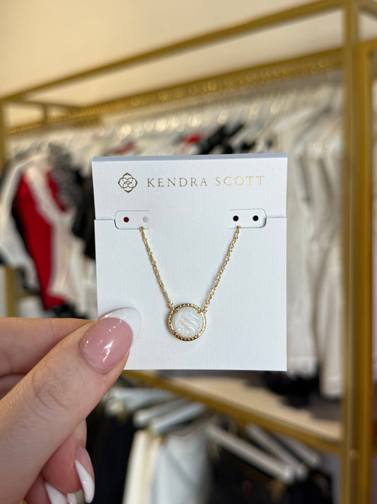 BOUTIQUE KENDRA SCOTT GOLD VOLLEYBALL PENDANT NECKLACE IVORY MOTHER OF PEARL IN HAND