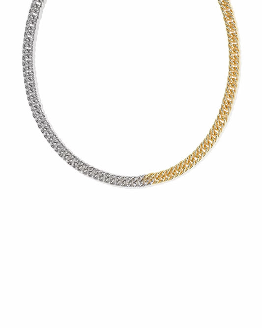 A two-tone chain necklace featuring a silver-toned left half and a gold-toned right half, arranged in a U-shape against a plain white background.