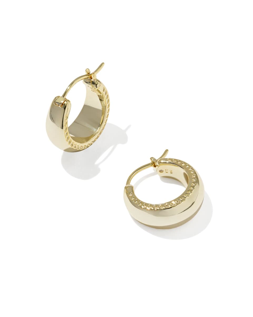 Gold hoop earrings on a white background