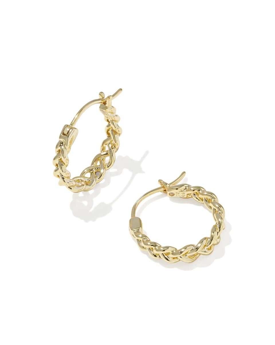 Gold hoop earrings on a white background