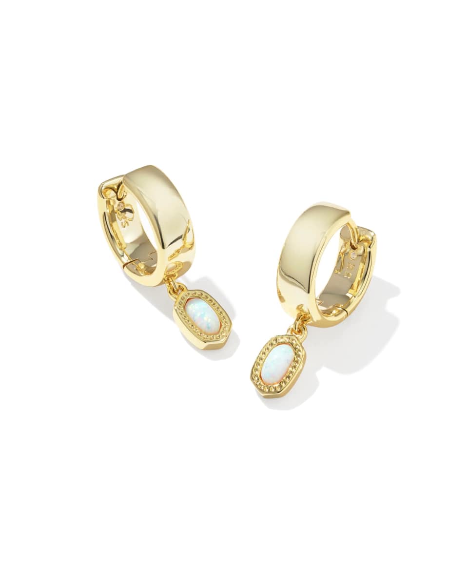 Gold hoop earrings with opalite stones on a white background