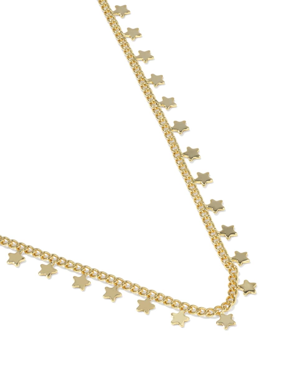 Gold necklace with star-shaped pendants on a white background