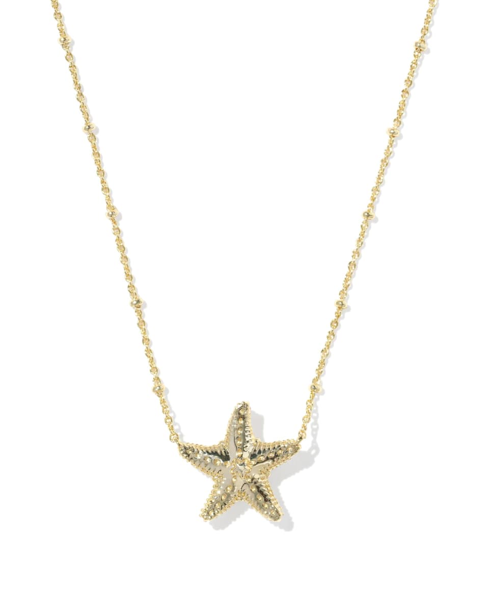 Gold starfish pendant necklace on a white background